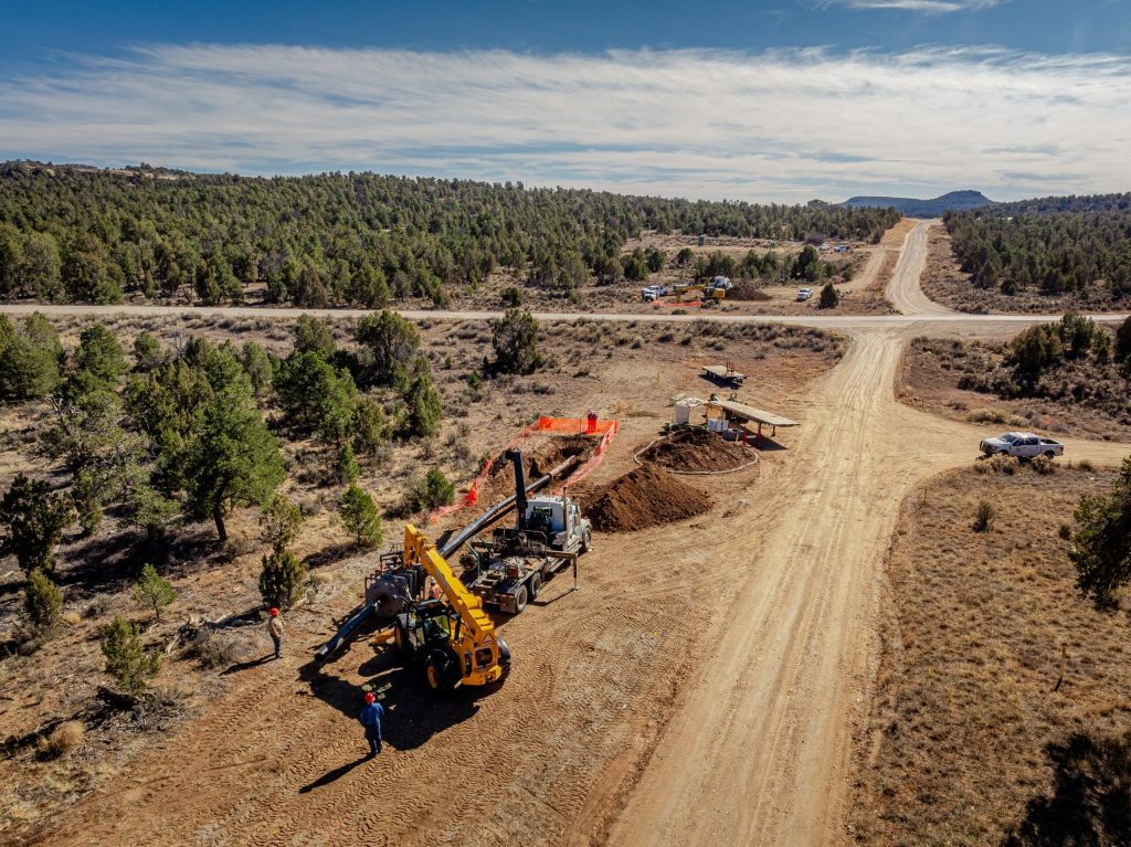 United Pipeline - Durango-HDD-Project-United-Pipeline Large equipment next to a dirt road in Durango completing a road bore and Tite Liner Installation